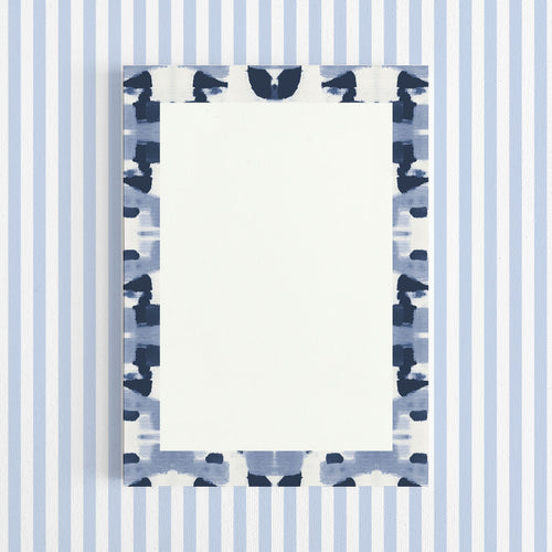 Blue and white striped pattern with abstract blue shapes