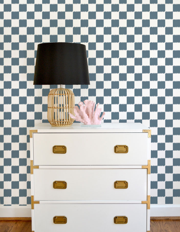 Blue and white ikat checker board wallpaper offered in peel and stick and traditional wallpapers. Perfect for a modern nursery, playroom, or kids bedroom.