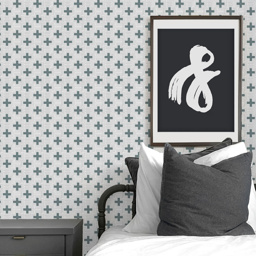 Green swiss cross peel and stick wallpaper for modern baby nursery and kids bedroom.